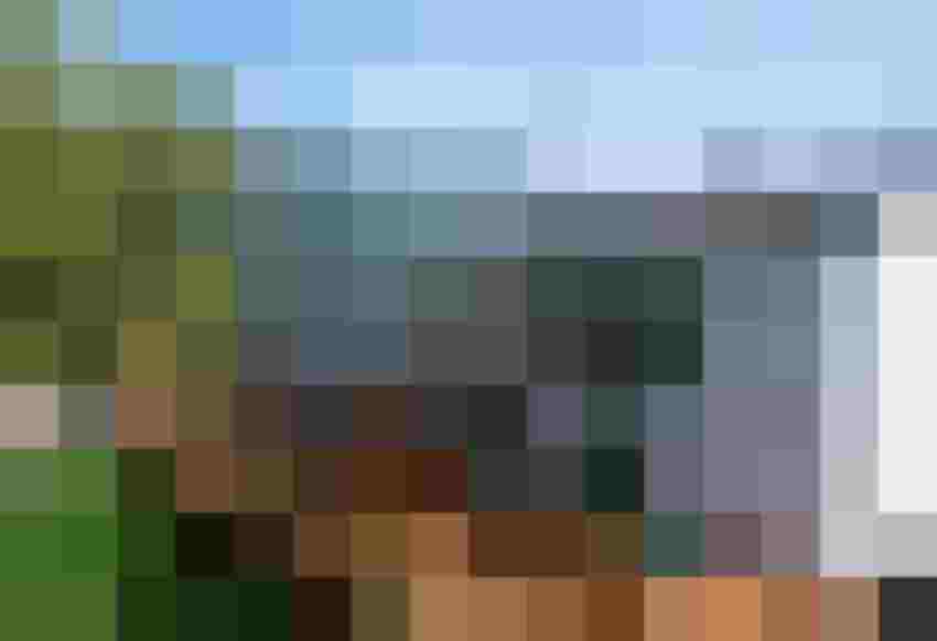 Gemütliches Mobilheim mit Terrasse im Grünen, ideal für einen Urlaub in den Alpen.